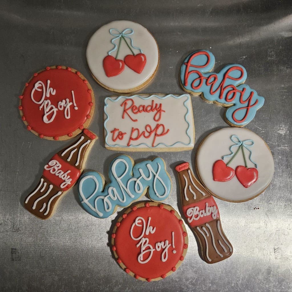 Oh Boy baby shower cookies with cola bottles and cherry hearts